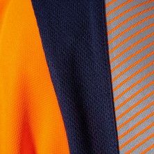 polo a.v. cofra tilcara v651 en naranja fluor